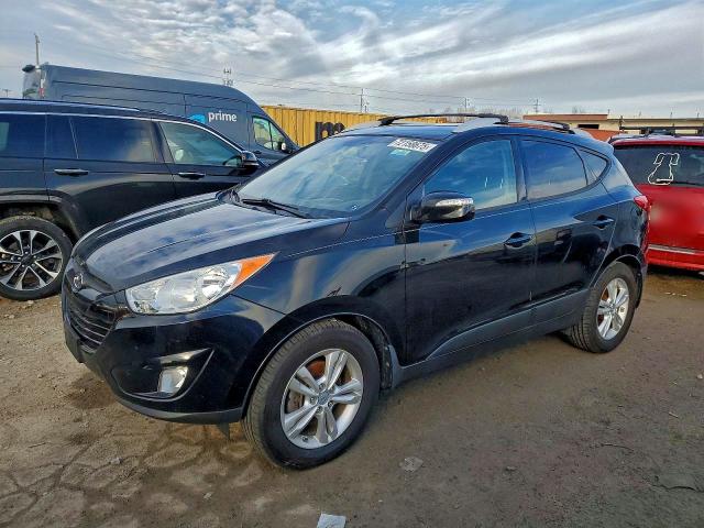 HYUNDAI TUCSON GLS 2013 with VIN KM8JUCAC0DU618934 - Photo from auction