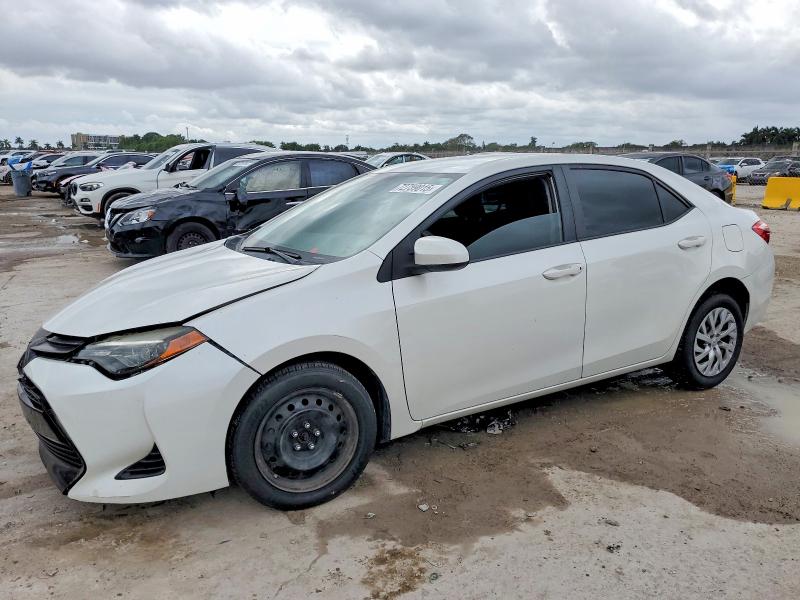 TOYOTA COROLLA 2019 with VIN 5YFBURHE9KP914841 - Photo from auction