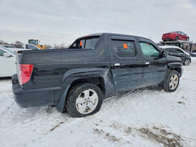 Photo 3 from auction – 2010 HONDA RIDGELINE with VIN 5FPYK1F50AB012603