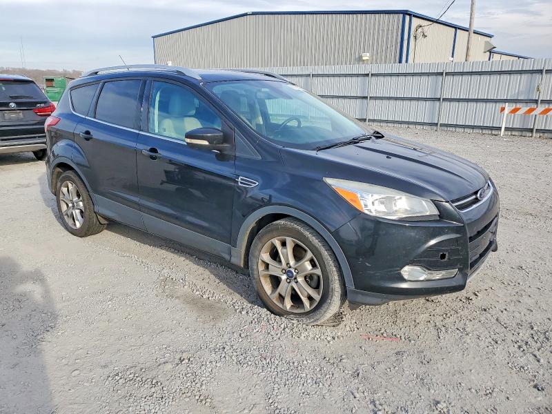Photo 4 from auction – 2014 FORD ESCAPE TIT with VIN 1FMCU9JX9EUB19923