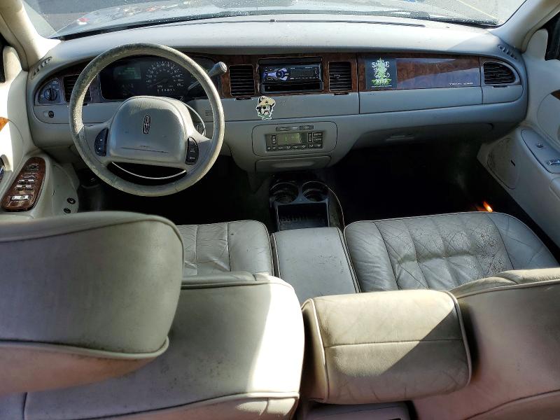 Photo 8 from auction – 1998 LINCOLN TOWN CAR E with VIN 1LNFM81WXWY620277