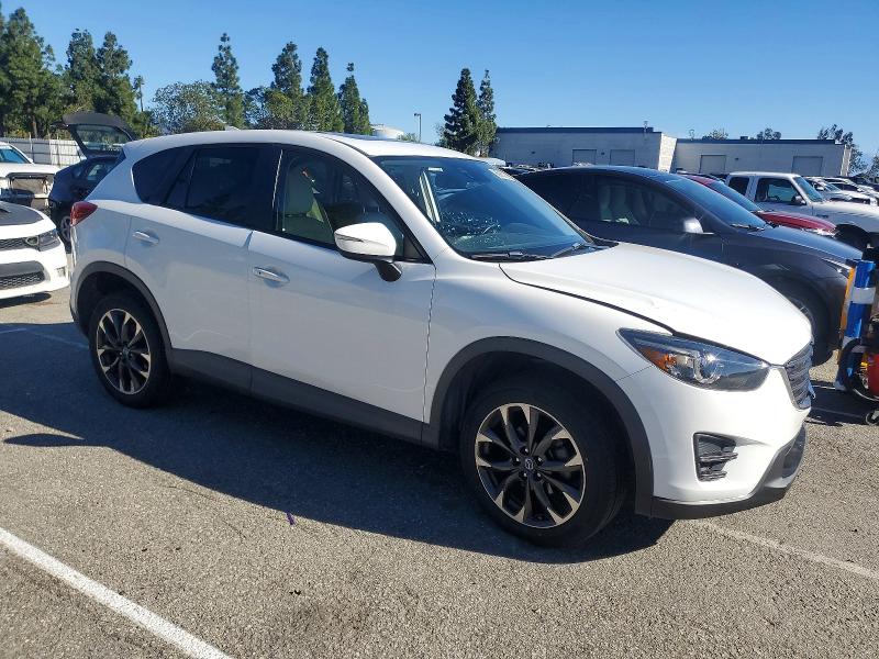 Photo 4 from auction – 2016 MAZDA CX-5 GT with VIN JM3KE2DY0G0736055