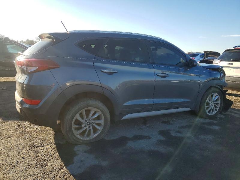 Photo 3 from auction – 2017 HYUNDAI TUCSON LIM with VIN KM8J33A40HU448169