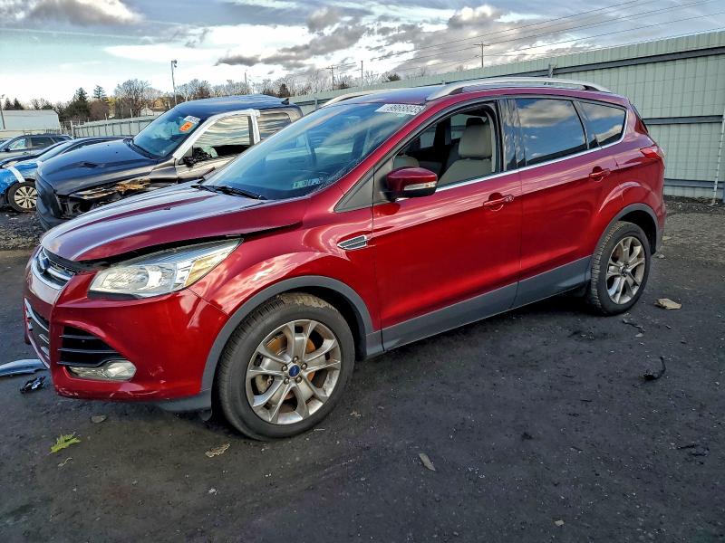 FORD ESCAPE TIT 2015 with VIN 1FMCU9J90FUA14142 - Photo from auction