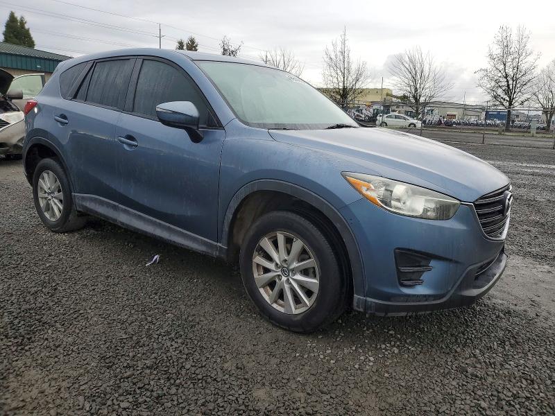 Photo 4 from auction – 2016 MAZDA CX-5 with VIN JM3KE2BYXG0676157