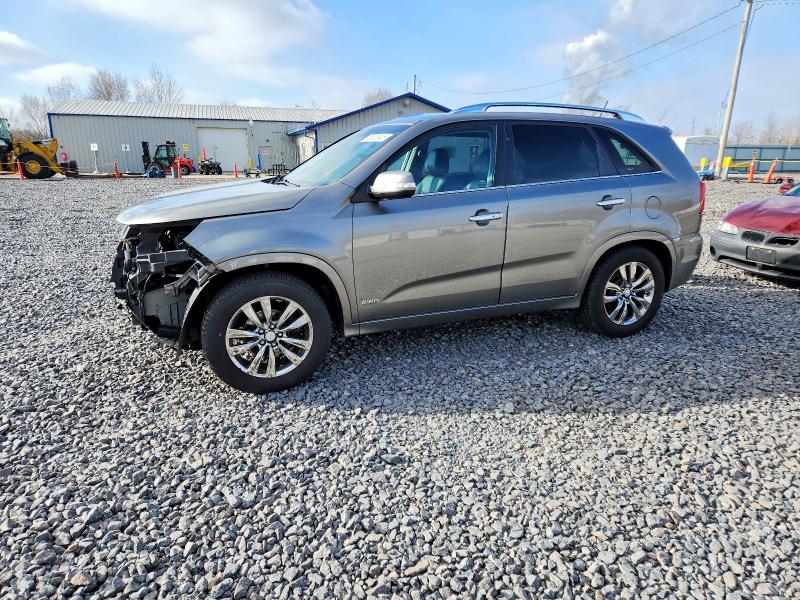 KIA SORENTO SX 2013 with VIN 5XYKWDA27DG372093 - Photo from auction