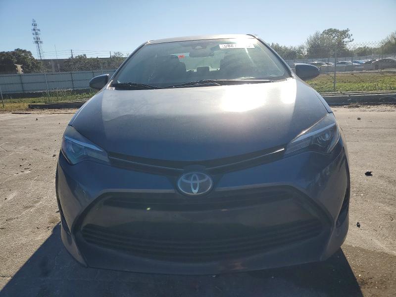 Photo 5 from auction – 2018 TOYOTA COROLLA L with VIN 5YFBURHE6JP844293