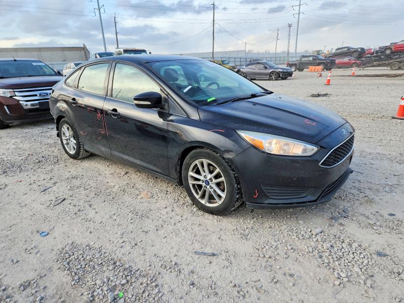 Photo 4 from auction – 2016 FORD FOCUS with VIN 1FADP3F20GL277737