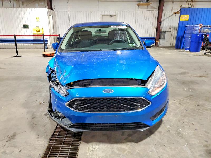 Photo 5 from auction – 2016 FORD FOCUS SE with VIN 1FADP3F28GL359442