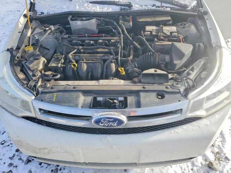 Photo 11 from auction – 2011 FORD FOCUS SE with VIN 1FAHP3FN9BW161987