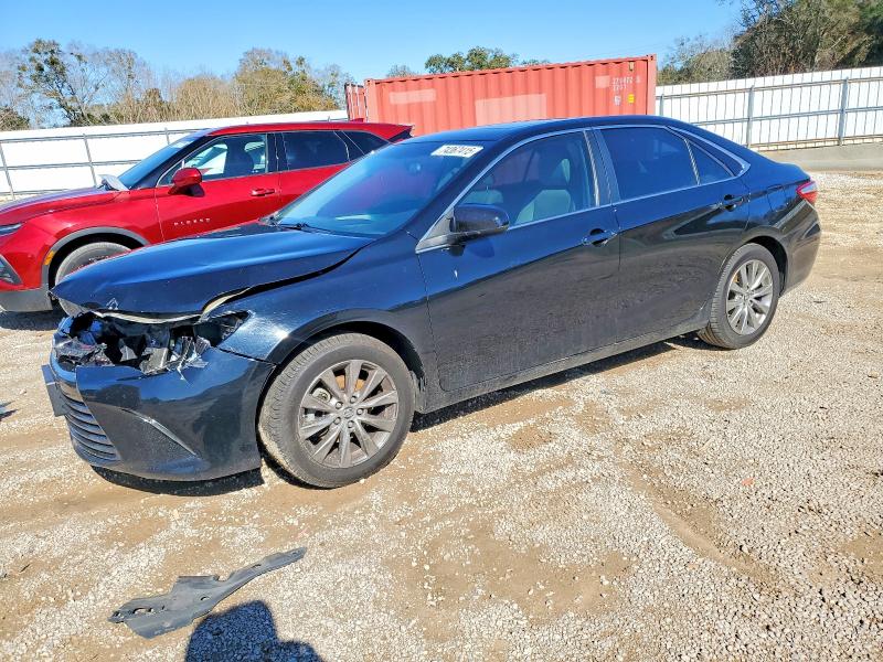 TOYOTA CAMRY LE 2016 with VIN 4T1BF1FKXGU606104 - Photo from auction