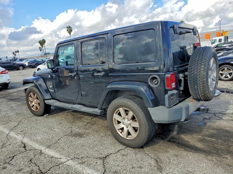 Photo 2 from auction – 2011 JEEP WRANGLER U with VIN 1J4HA7H1XBL610165