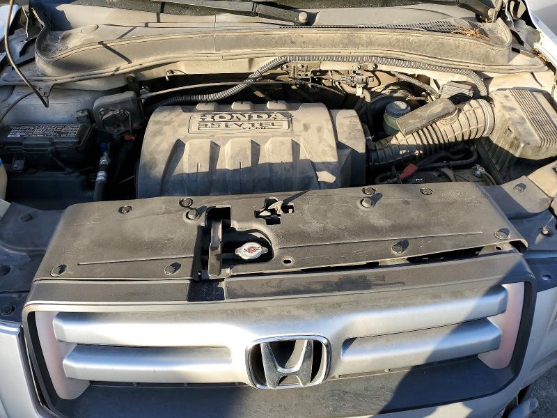 Photo 11 from auction – 2006 HONDA PILOT EX with VIN 5FNYF28516B029708