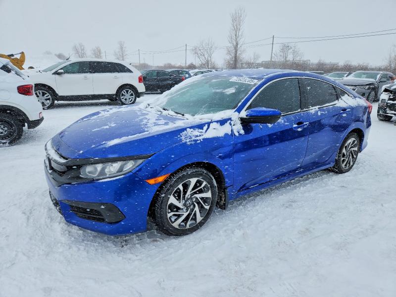 HONDA CIVIC LX 2017 with VIN 2HGFC2F54HH031129 - Photo from auction