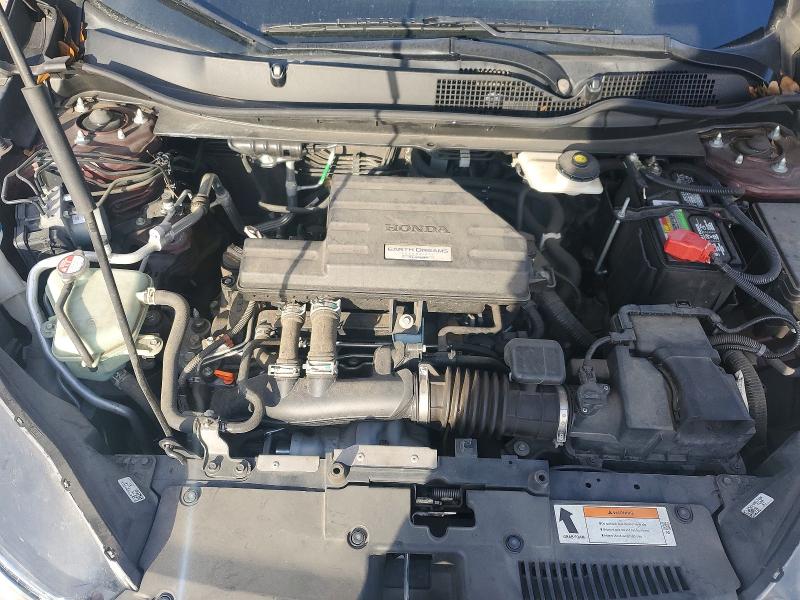 Photo 12 from auction – 2017 HONDA CR-V with VIN 7FARW1H98HE032923