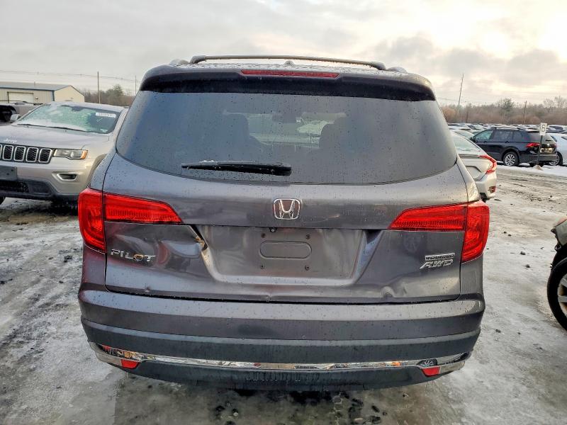 Photo 6 from auction – 2017 HONDA PILOT TOUR with VIN 5FNYF6H94HB059363
