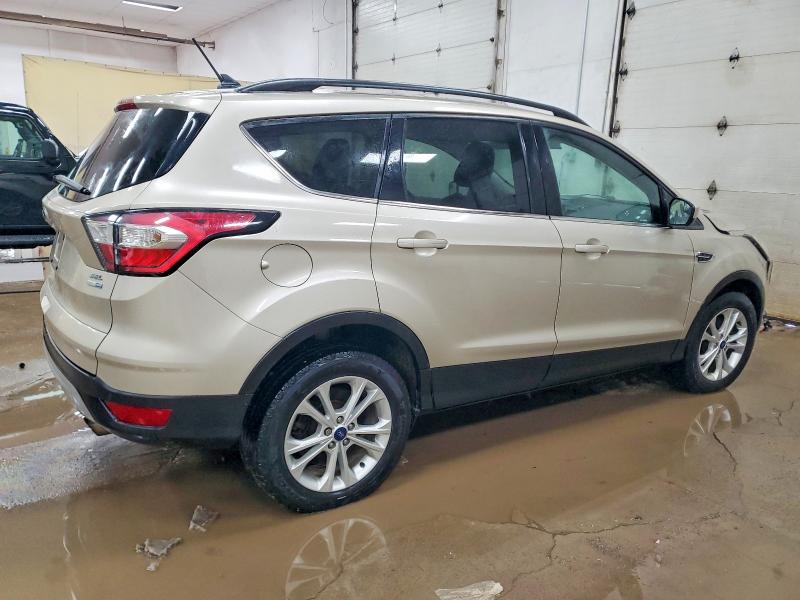 Photo 3 from auction – 2018 FORD ESCAPE with VIN 1FMCU9HD5JUA52386