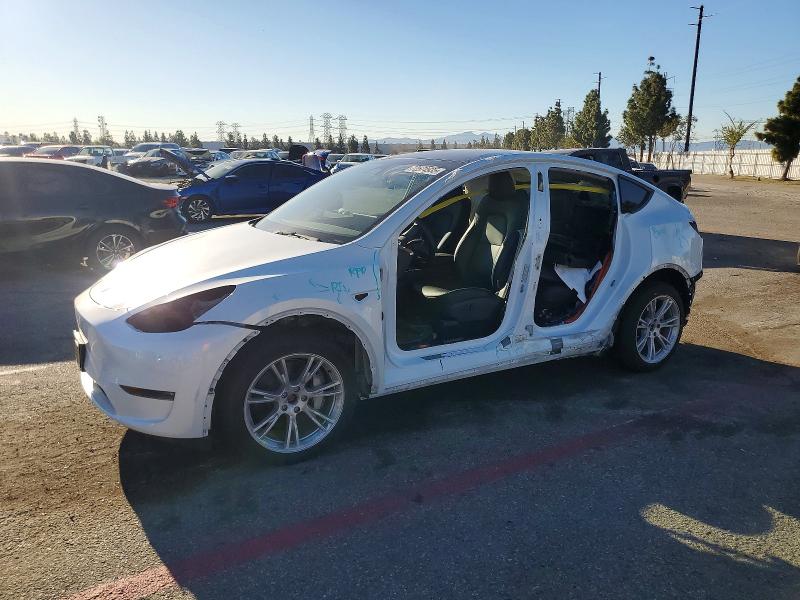 TESLA MODEL Y 2023 с VIN 7SAYGDEE5PA073340 - Фото с аукциона