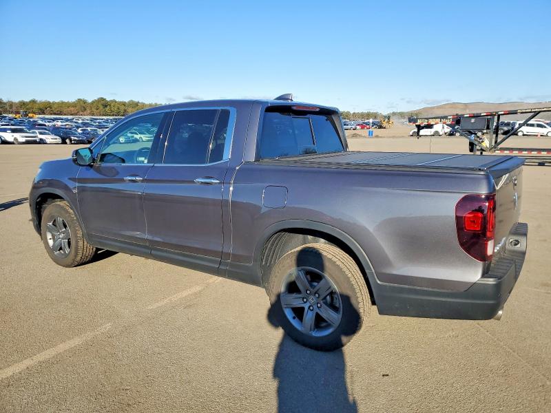 Photo 2 from auction – 2023 HONDA RIDGELINE with VIN 5FPYK3F70PB016463
