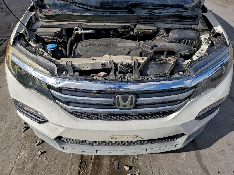 Photo 12 from auction – 2016 HONDA PILOT TOUR with VIN 5FNYF5H97GB022798