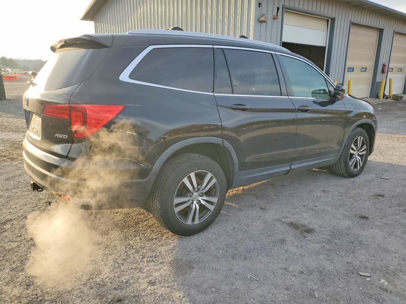 Photo 3 from auction – 2016 HONDA PILOT EXL with VIN 5FNYF6H53GB005709