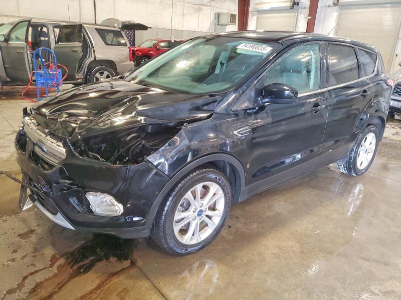 FORD ESCAPE SE 2017 with VIN 1FMCU9G98HUE36525 - Photo from auction