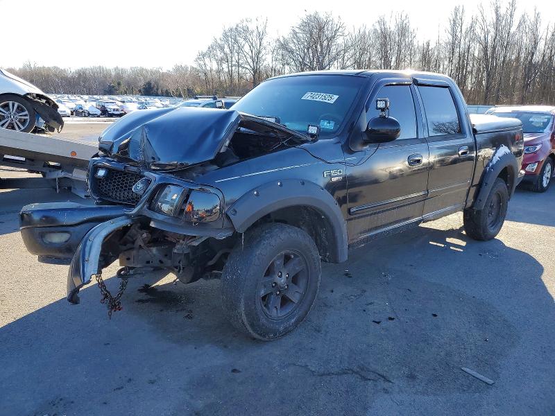 FORD F150 SUPER 2002 with VIN 1FTRW08L32KB51054 - Photo from auction