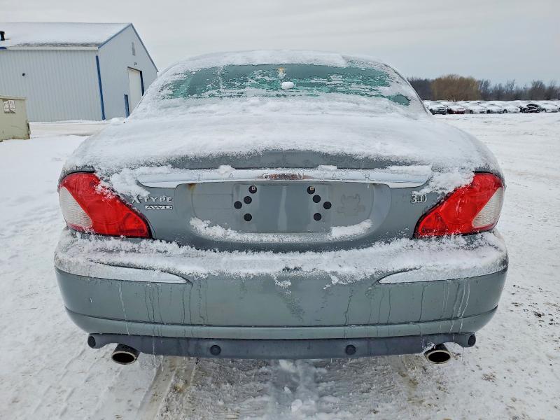 Photo 6 from auction – 2004 JAGUAR X-TYPE 3.0 with VIN SAJEA51C64WD81630