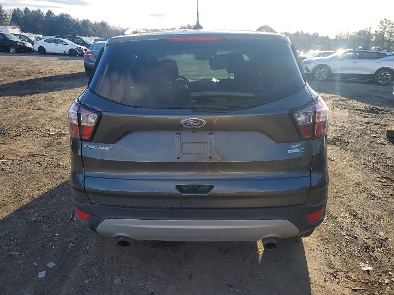 Photo 6 from auction – 2018 FORD ESCAPE with VIN 1FMCU9GD9JUC19110
