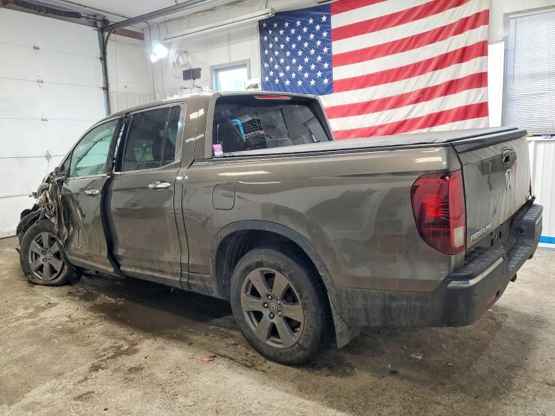 Photo 2 from auction – 2020 HONDA RIDGELINE with VIN 5FPYK3F76LB013853