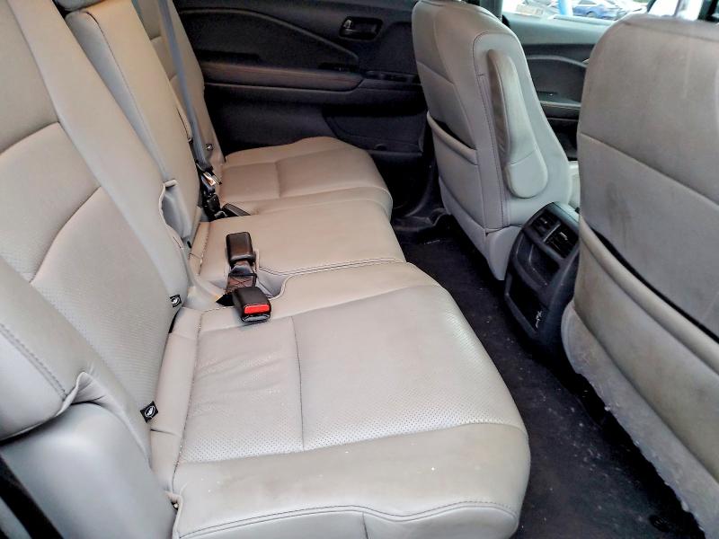 Photo 11 from auction – 2023 HONDA PASSPORT E with VIN 5FNYF8H54PB036270