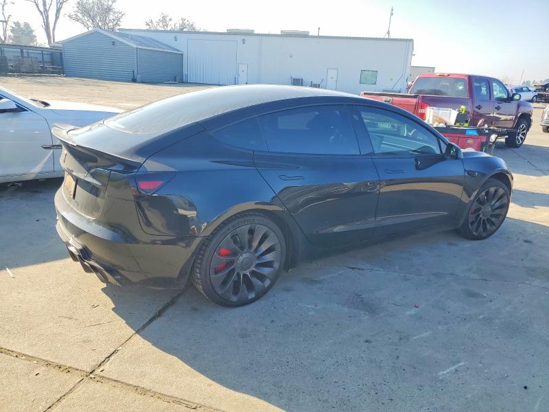 Photo 3 from auction – 2021 TESLA MODEL 3 with VIN 5YJ3E1EC8MF099343