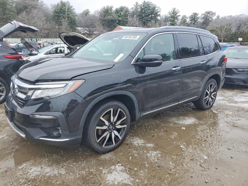 HONDA PILOT TOUR 2022 con VIN 5FNYF6H62NB062117 - Foto de la subasta