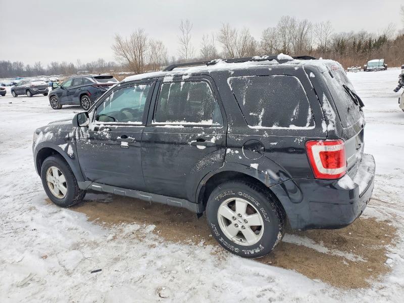 Photo 2 from auction – 2010 FORD ESCAPE with VIN 1FMCU0D70AKD44129