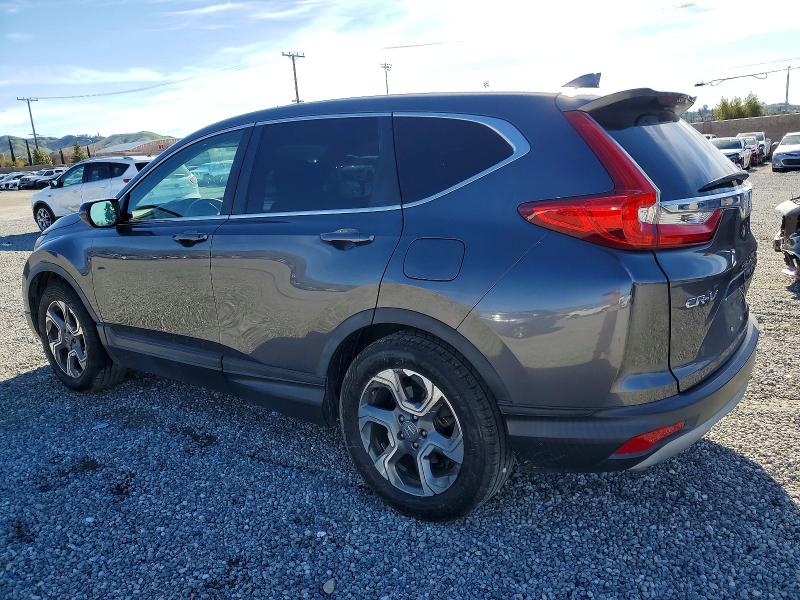 Photo 2 from auction – 2019 HONDA CR-V with VIN 5J6RW1H80KA013232