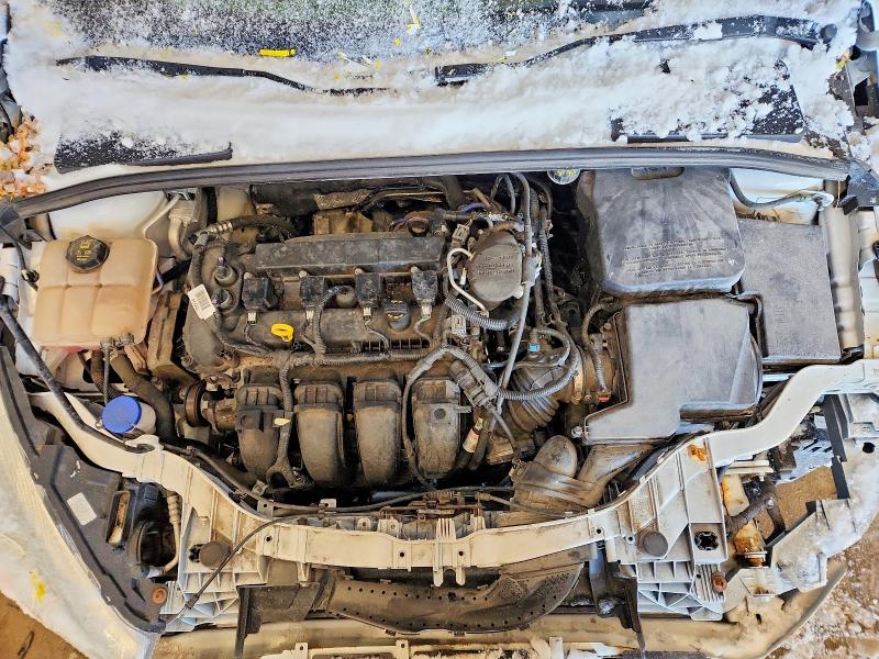 Photo 11 from auction – 2015 FORD FOCUS with VIN 1FADP3F24FL373157