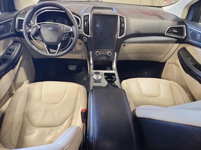 Photo 8 from auction – 2021 FORD EDGE TITAN with VIN 2FMPK4K93MBA31349