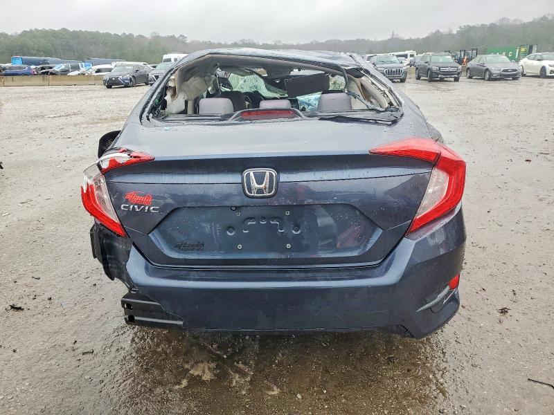 Photo 6 from auction – 2017 HONDA CIVIC LX with VIN 19XFC2F57HE215247