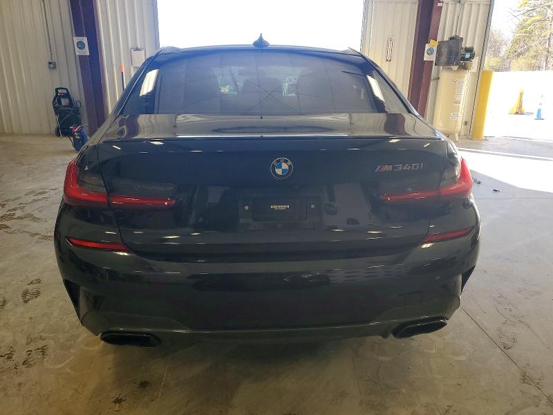 Photo 6 from auction – 2022 BMW M340I with VIN 3MW5U7J05N8C48921