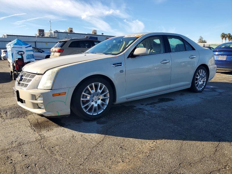 CADILLAC STS 2010 with VIN 1G6DU6EAXA0148154 - Photo from auction
