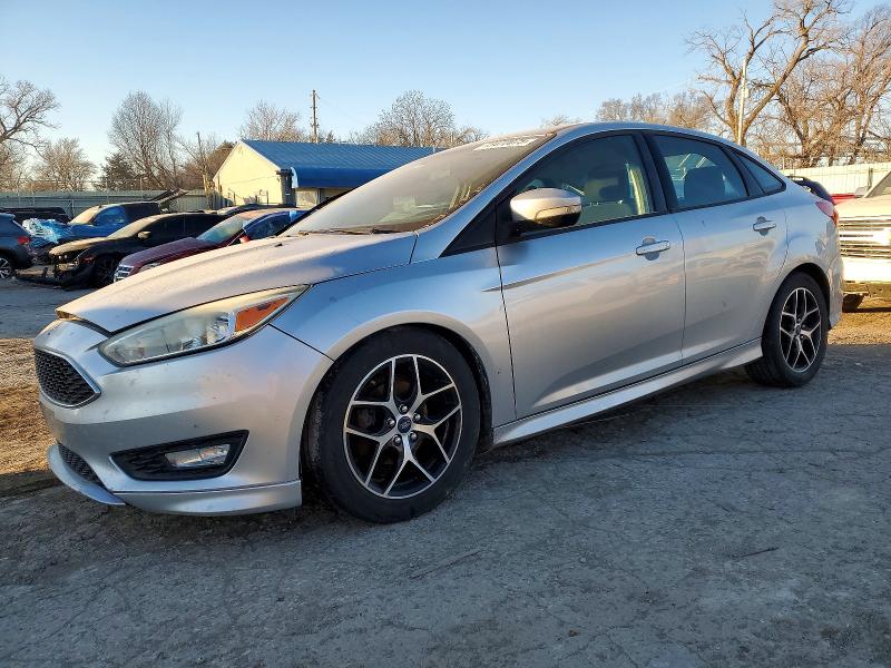 FORD FOCUS SE 2015 with VIN 1FADP3F28FL293781 - Photo from auction