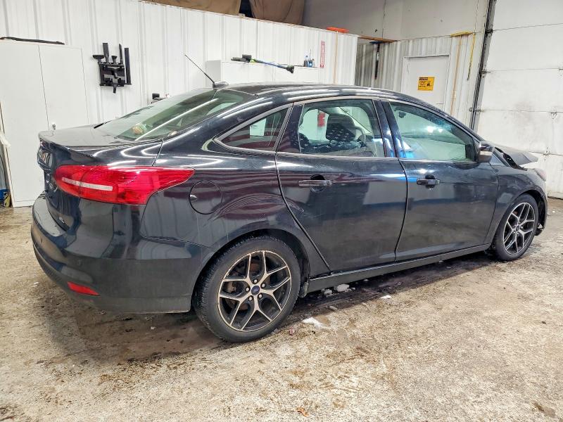 Photo 3 from auction – 2018 FORD FOCUS with VIN 1FADP3H26JL200133