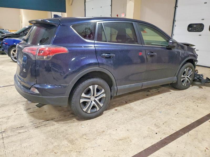 Photo 3 from auction – 2018 TOYOTA RAV4 LE with VIN JTMBFREV0JJ737890