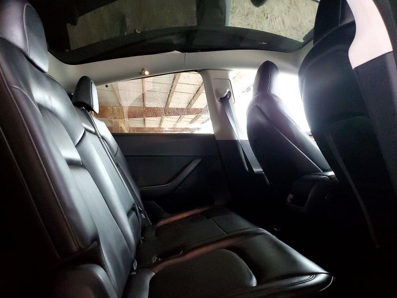 Photo 11 from auction – 2023 TESLA MODEL Y with VIN 7SAYGAEE6PF630449