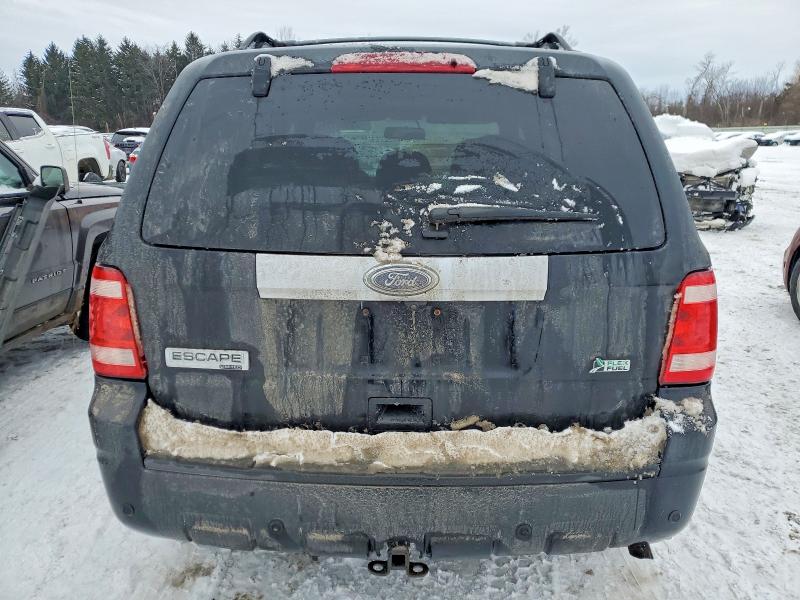 Photo 6 from auction – 2010 FORD ESCAPE LIM with VIN 1FMCU9EG6AKA04048
