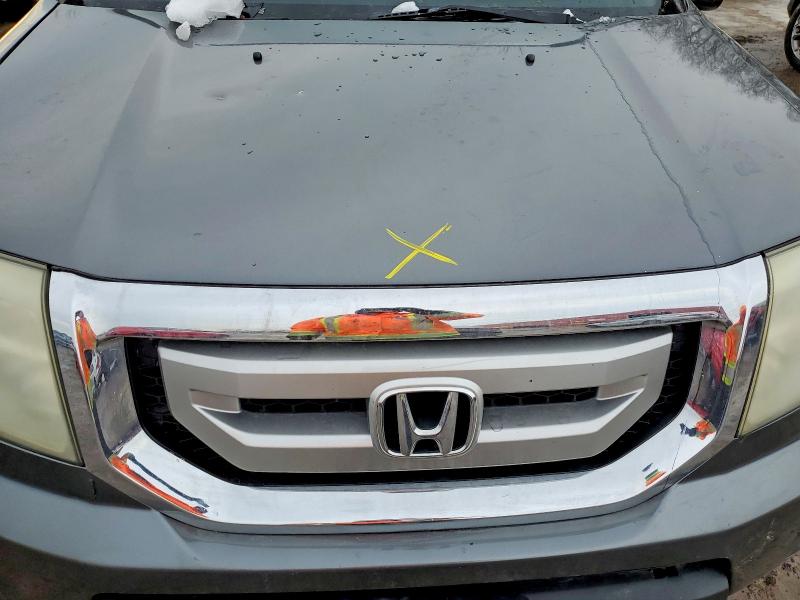 Photo 12 from auction – 2011 HONDA PILOT TOUR with VIN 5FNYF4H98BB016642