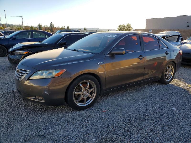 TOYOTA CAMRY HYBR 2007 with VIN JTNBB46K973044683 - Photo from auction