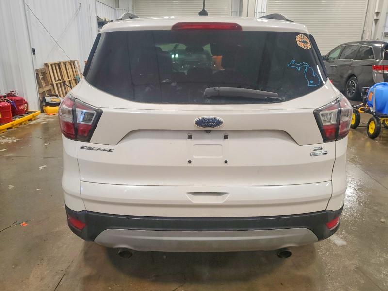 Photo 6 from auction – 2017 FORD ESCAPE with VIN 1FMCU9GD1HUA66278