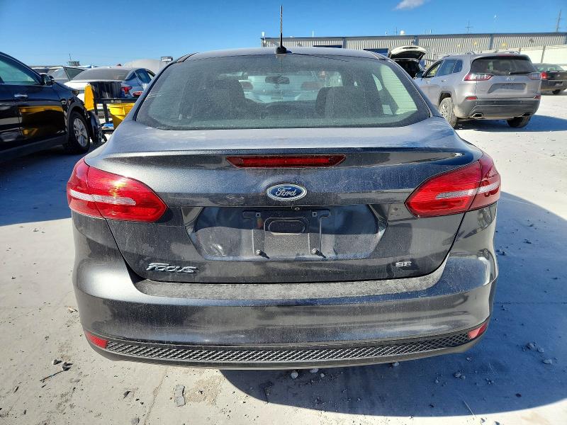 Фото 6 с аукциона – 2018 FORD FOCUS SE с VIN 1FADP3F29JL210836