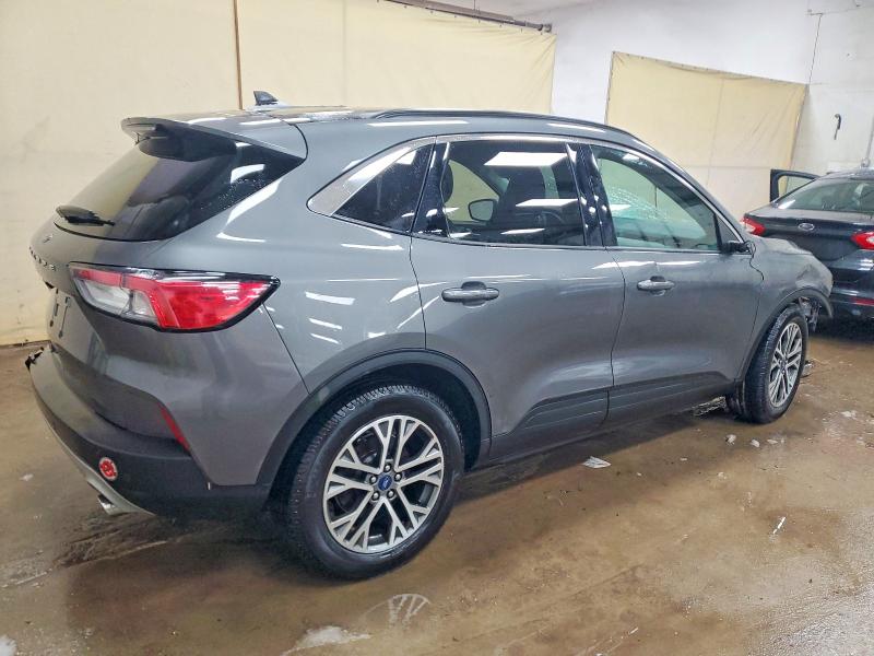 Photo 3 from auction – 2021 FORD ESCAPE with VIN 1FMCU0H60MUA06515
